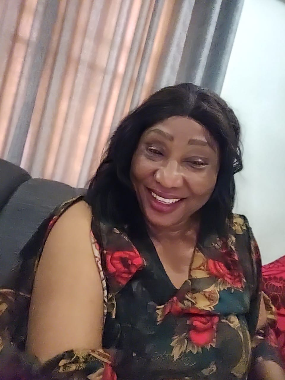 Pastor Clara Edua Emua smiling warmly